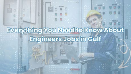 Engineer working on electrical control panel with laptop – Engineers Jobs in Gulf